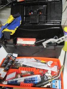 Plastic toolbox containing a wide v...