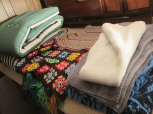 Variety of beach and bath towels, A...