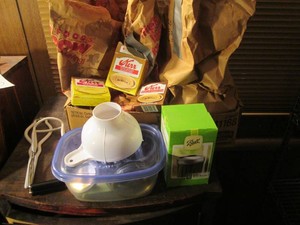Canning lids, rings, glass jars and...