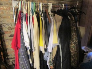 Metal garment rack with assorted me...