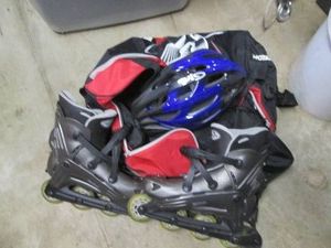 Mens size 10 roller blades and pro...