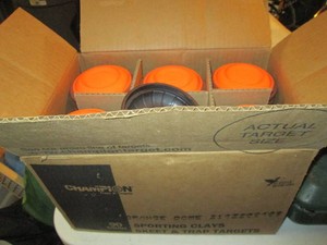 Box of Champion sporting clay skeet...