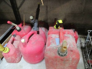 Variety of assorted size fuel cans ...
