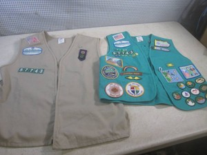 (CS) 2 Girls Scout Vests Full of Paches and Pins