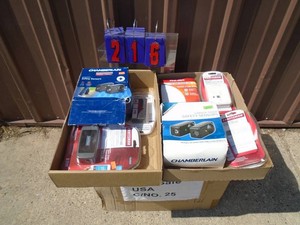 Qty of 2 flats of Craftsman garage door openers. As shown.