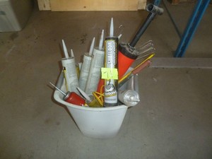 Assorted Caulking Tubes in Basket