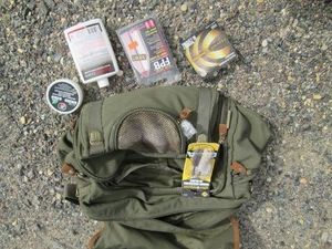Field and Stream gear bag with muzzle loading primers, ramrod cleaners and more