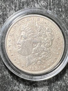 1884-O US MORGAN SILVER DOLLAR IN AIRTITE