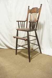 antique wooden press back high chair late 19th or early 20th century. Missing tray