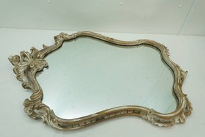 ornate vintage Rococo-style wall mirror with elaborate carved gold and antiqued scroll frame 34 x 23