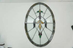 vintage handcrafted stained glass panel featuring a floral or abstract motif 30 x 20 some pieces of glass are cracked