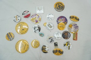 group of vintage Dawson Blackjack Homecoming buttons including a 1946 Ducks Unlimited button