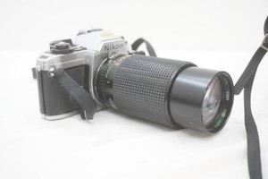 Nikon FG-20 camera with case, Sears Model No. 202 lens with case