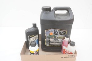 Penn 30wt oil app. 2 gal., full can starting fluid, full quart of bar and chain oil partial container Sta-bil