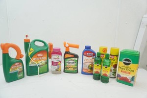 lawn and garden feed and weed killer - most containers are full