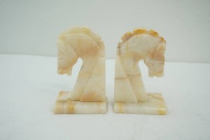 vintage pair of carved onyx or marble horse head bookends styled in a classic chess knight design 6 tall