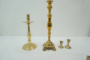 4 brass candle stick holders 2 12 to 17