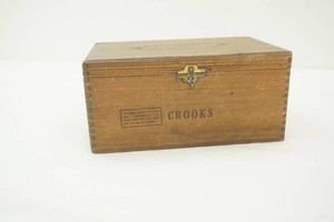 vintage Crooks wooden cigar box with a few keepsake items inside