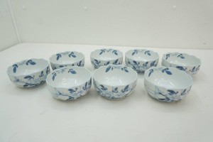 Japanese blue and white porcelain kobachi bowl with scalloped rim and hand painted floral motifs