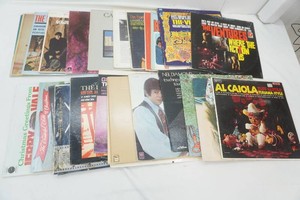 group of vintage vinyl albums including John Denver, Neil Diamond, Boyd Goldsboro, Fleetwood Mac, The Fleetwoods, Exodus, Jerry Vale, The Kingston Trio