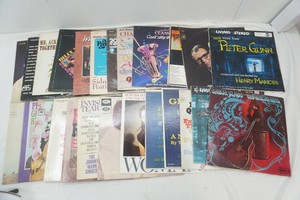group of vintage vinyl albums including Peter Gunn, Glenn Miller, Gabor Szabo, The Beatles, The Johnny Mann singers, Ray Charles, The Wild Angels