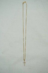 14k gold cross pendent on gold chain with diamond stones passed the diamond tester