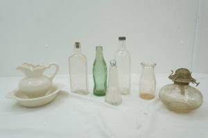 vintage bottles, lantern, mini ceramic wash bowl and pitcher