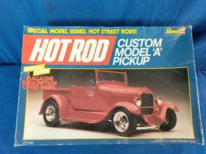 Revell #7136 125 Custom Model A Pickup plastic model kit featuring a red 1929 Ford hot rod.