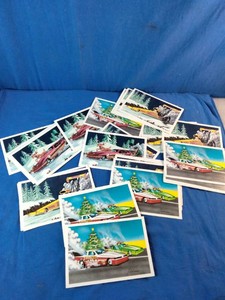 Collection of 25 vintage-style holiday greeting cards featuring hot rod and drag racing themes,