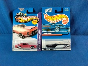 Two Mattel Hot Wheels diecast cars in their original packaging
