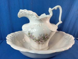 Vintage ceramic or porcelain pitcher and wash basin set