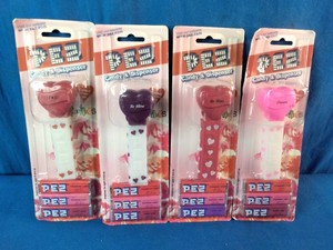Vintage Valentines Day heart-shaped PEZ candy dispensers