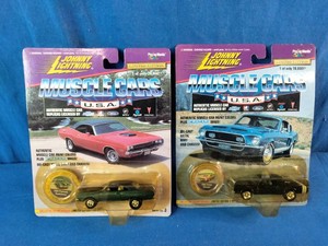 Two 164 scale die-cast toy cars from the Johnny Lightning Muscle Cars U.S.A. limited edition series.