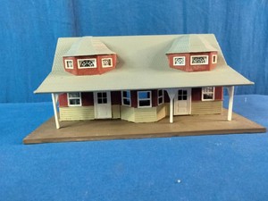 Vintage HO scale model train station kit, resembling the Revell Small Town Station or similar 1950s plastic railroad building models.