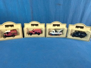Set of four vintage die-cast commemorative model trucks made by Lledo Days Gone