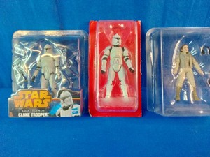 Three 3.75-inch Star Wars action figures in blister packaging, including a Hasbro Star Wars Saga Legends SL02 Clone Trooper