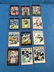 A collection of 12 assorted NFL football trading cards,