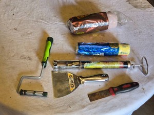 Paint roller frame, caulk gun, putty knives, and paint roller sleeves
