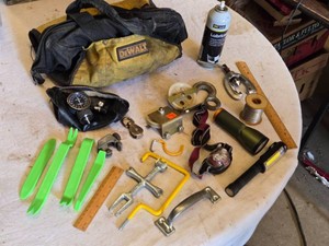 DeWalt Tool Bag with Miscellaneous Tools and Accessories, Flashlights, Tire Gauge