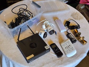 Swann Security System Including NVR and Cameras, Remote, Surge Protector, and Miscellaneous Electronics - All Untested, Unsure if Remote is for the Swann