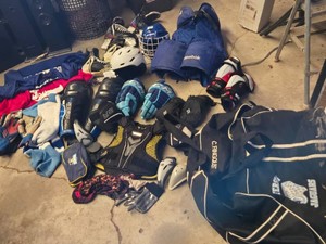 HUGE Lot of Hockey Equipment including CCM Gloves, Bauer Shoulder Pads, Ski Helmets, Ice Skates, and Hockey Sticks - See All Pics