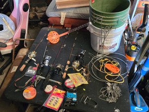 Ice Fishing Rods and Tackle Equipment, Pails including Quantum, Crystal River, and Cherrywood Reels