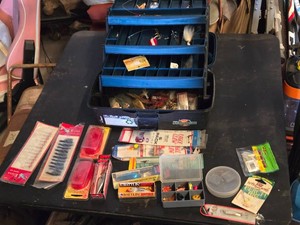 Tackle Box with Fishing Lures and Accessories including Rapala Lures, Hooks, and Spinner Bait