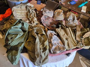 Military Bags and Gear Lot including Backpacks, Hats, Pouches, and Canteen
