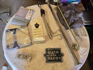 Home decor and bathroom accessories including Wilko 180x200cm shower curtain set, bottle opener sign, curtain rod, and Wash Your Hands plaque