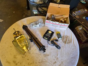 Brass Outdoor Wall Lantern, Stanley 12 Staples, Delta Faucet Kit, and DLV Levelarm