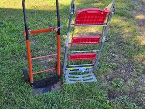 Lot including Two Hand TrucksDollies with one that doubles as a ladder