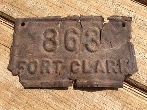 Antique FORT CLARK Embossed Metal Plate 5 14 x 3 18