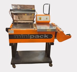 Minipack-Torre FM75 Commercial Shrink Wrap Machine  L-Bar Sealer  Film Roll & Rolling Stand