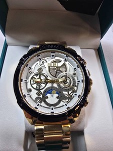 BIBI Luxury Watch  Skeleton-Style Watch  w Quartz Movement   Gold-Tone Bracelet  Black Bezel  47.22mm  Box & Tag